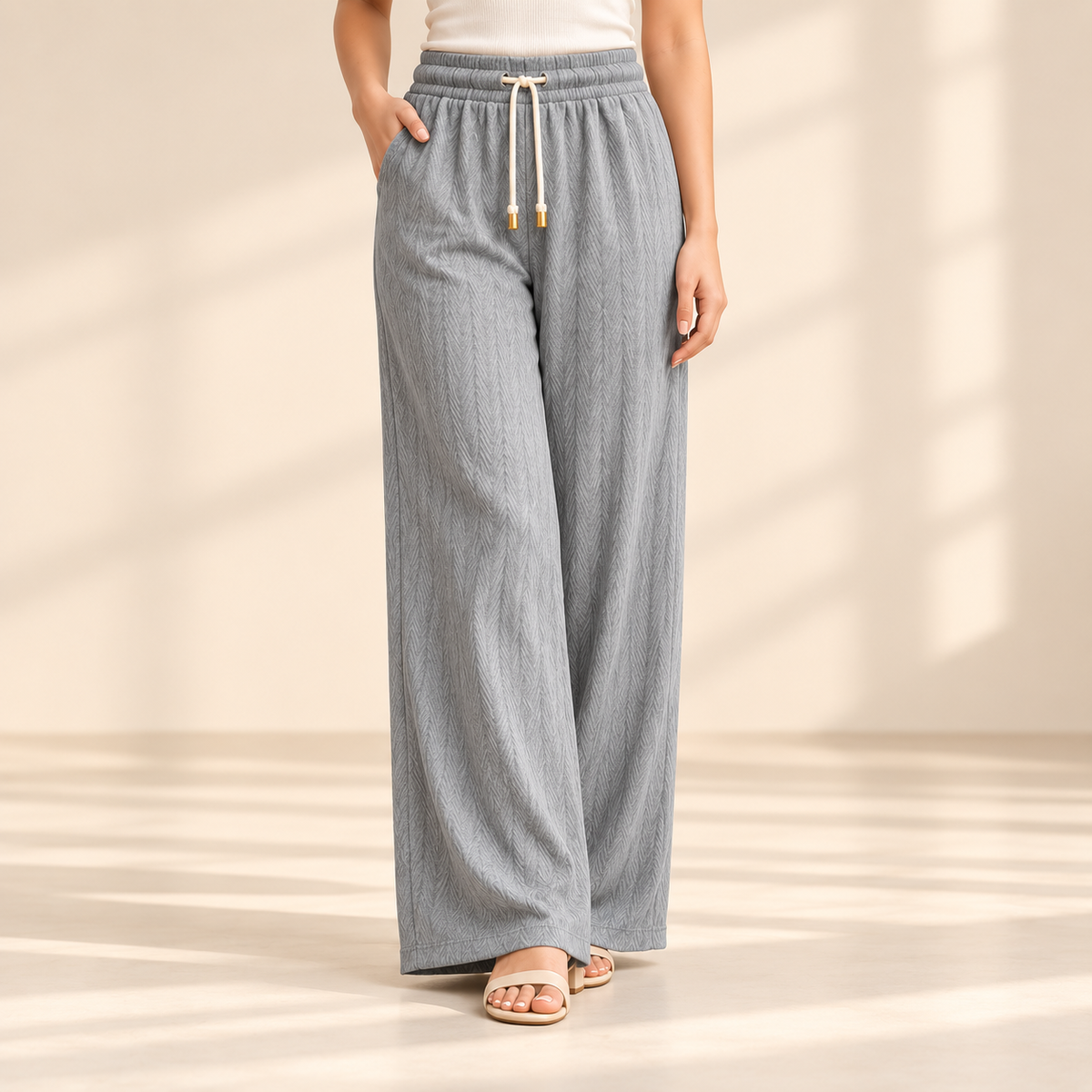 Sana Outfits grey palazzo pants worn by model